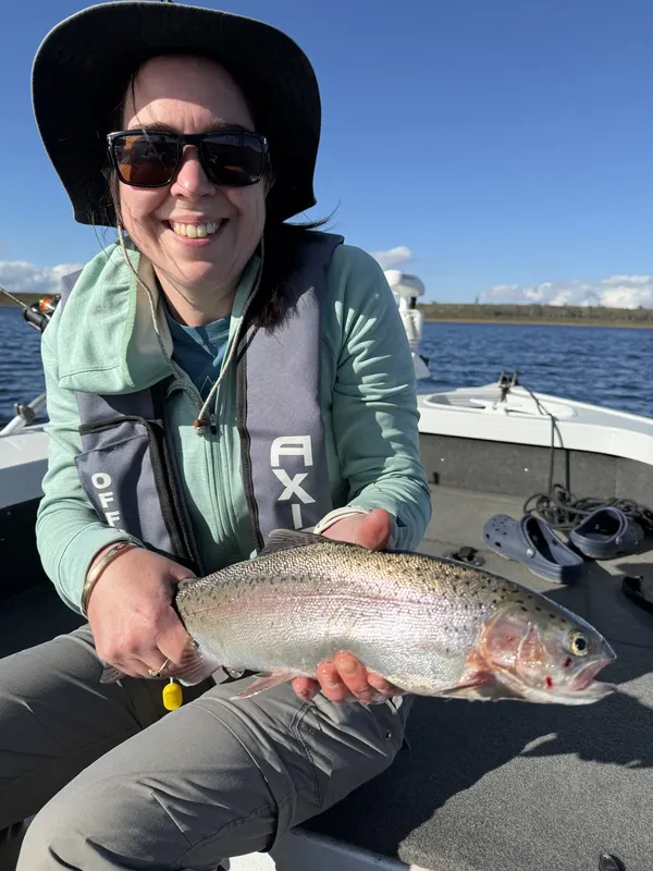 Angler with a rainbow trout